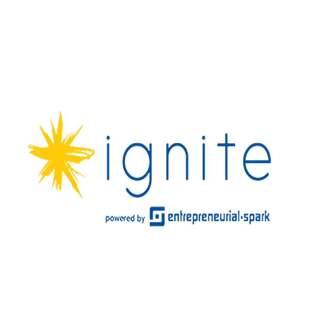 Biểu tượng Ignite Bermuda có đồ họa bùng nổ màu vàng bên cạnh từ “ignite” bằng chữ thường màu xanh lam, cùng dòng giới thiệu “được hỗ trợ bởi Entrepreneurial Spark.